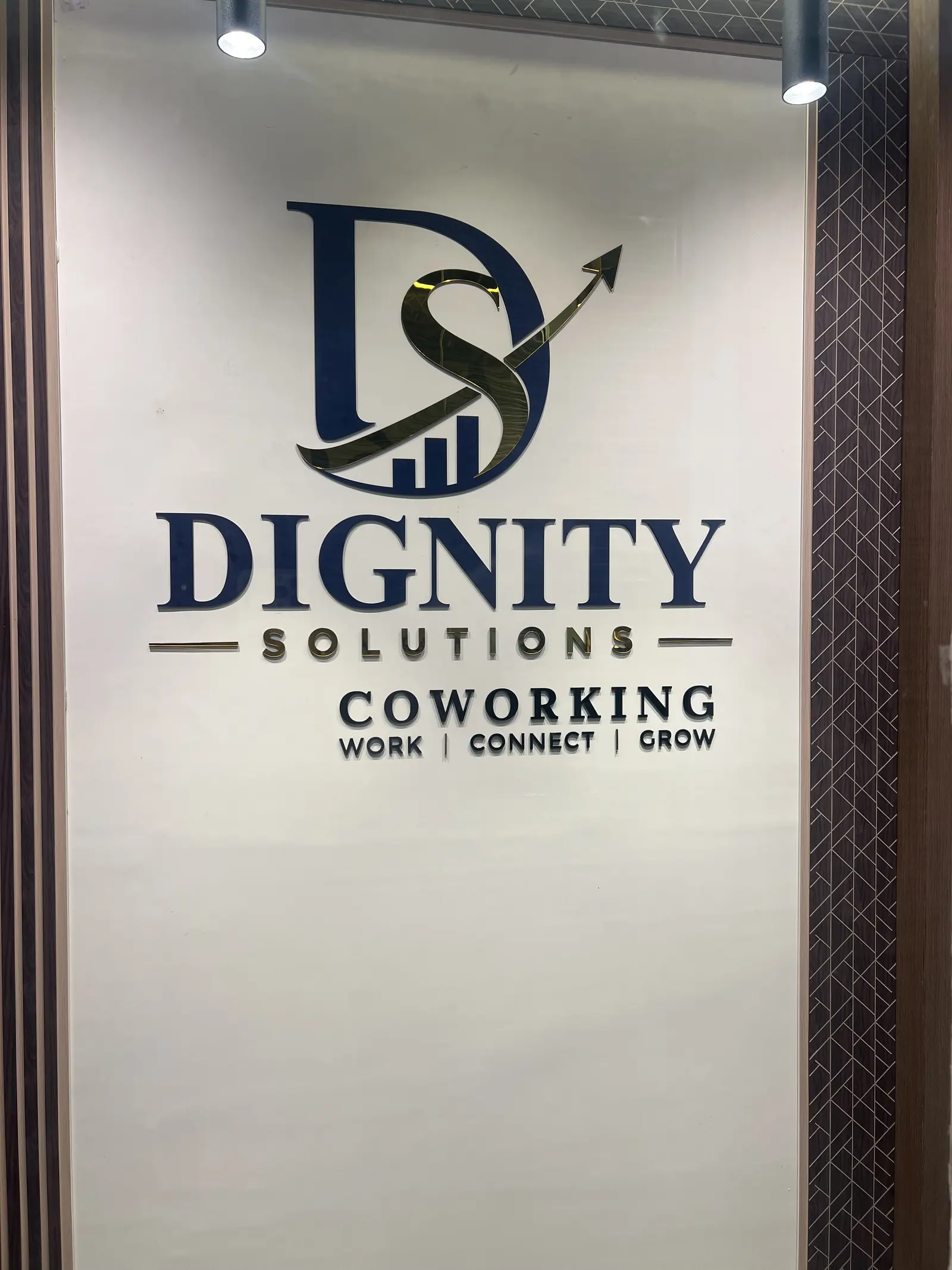 The Dignity Solutions Coworking sign: Work, Connect, Grow